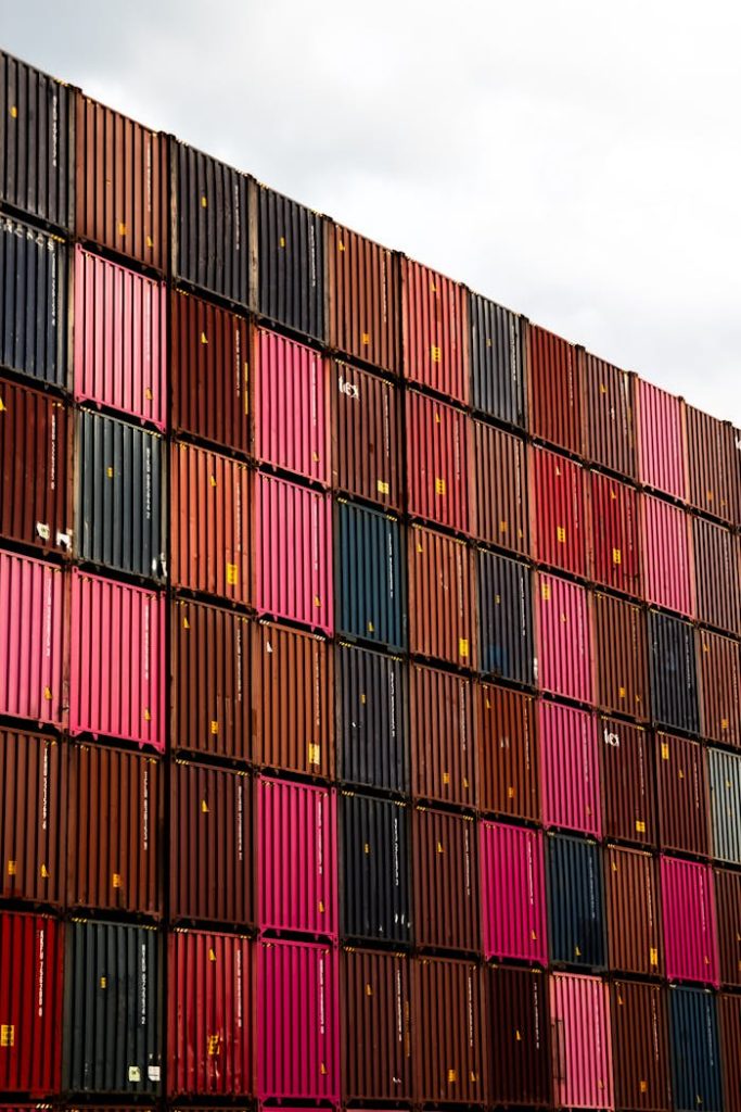Crafting Captivating Headlines: Your awesome post title goes here Stacked cargo containers in vibrant colors at Hamburg port.